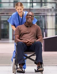 Happy patient and nurse outdoors