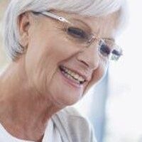 Joyful older lady with short hair