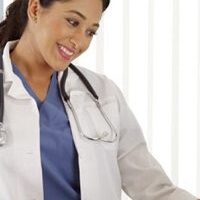 Healthcare worker in a white coat